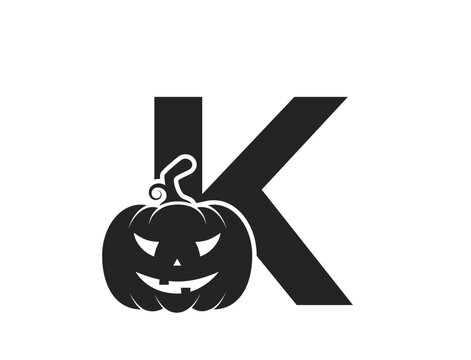 letter k with jack o lantern. creative halloween alphabet logotype. pumpkin face vector image