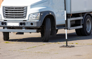 A truck at the training ground goes around the tags. Truck driving training.