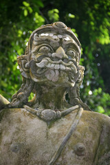 Obraz premium Buddha statues in secret magic garden on Koh Samui, Thailand. Ancient stone statues in secret Buddhism Magic Garden, Koh Samui, Thailand. A place for relaxation and meditation.