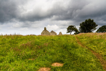 Beautiful old welsh chapel or church, ruin, sky as copyspace top. - 654997984
