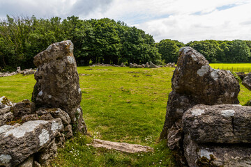 Din Lligwy ancient village in Anglesey, stone entrance. - 654997997