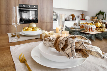 Christmas setting on dining table in kitchen, closeup