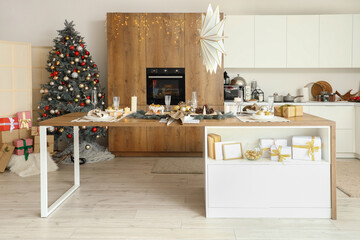 Dining table with Christmas setting in kitchen