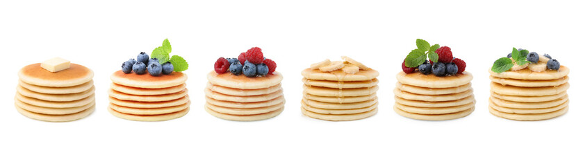 Fototapeta na wymiar Set of tasty pancakes with toppings isolated on white