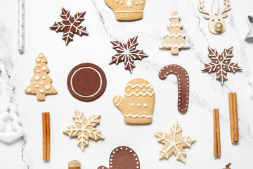 Christmas gingerbread cookies and decor on white grunge background