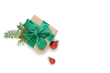 Christmas balls and gift box on white background