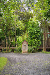 Nature garden background image with a magic gate located in the middle of the garden.