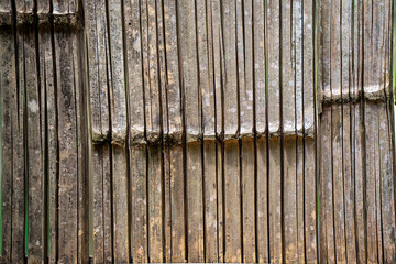 Background image of bamboo slats inside.