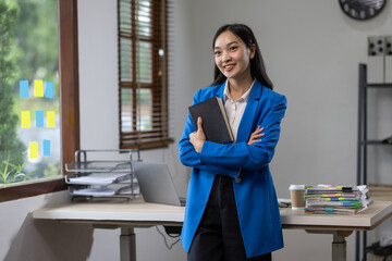 Portrait of successful business asian women arms crossed and smile dressed casually with happy and...