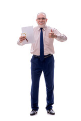 Old businessman holding loupe isolated on white