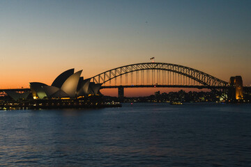Fototapeta na wymiar city harbour bridge and opera house at sunset, Sydney