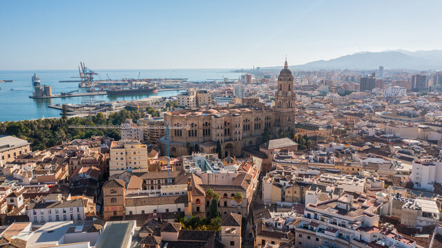 Aerial photo from drone to Alcazaba and Castle of Gibralfaro in the background a panoramic view of the city of Malaga and old town Malaga at sunset. Malaga,Costa del sol, Andalusia,Spain, (Series)