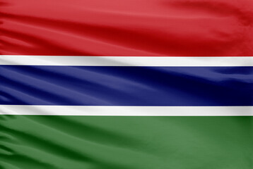 Gambia flag is depicted on a sport stitch cloth fabric with folds.