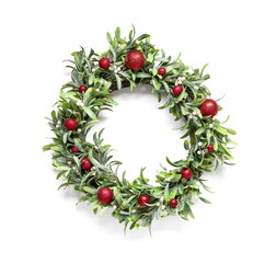 Fototapeta na wymiar Beautiful mistletoe wreath on white background