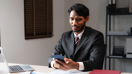 Businessman using smartphone to researching data and analyzing strategy of startup business project