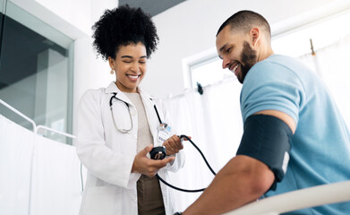 Happy doctor, patient and blood pressure for appointment, checkup or visit at hospital. Medical woman, surgeon or nurse helping man, customer or client for monitoring heart rate at healthcare clinic