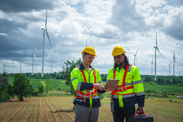 Green ecological Sustainable energy industry concept, Wind turbine Engineers working in wind turbine farm , Generator station, renewable energy