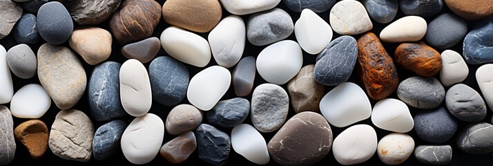 White pebble stone background texture. Stone pebbles background. Background of many pebbles. Colorful pebbles background.