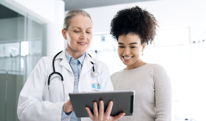 Doctor, woman and tablet in healthcare consultation, hospital support and feedback or online...