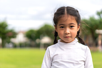 Portrait happy asian cute girl smiling face looking and think, kid, child, young adorable, student, elementary school and education concept