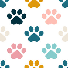 Paws or footprints of cats and dogs on a white background create a cute seamless pattern for fashion fabrics. Vector.