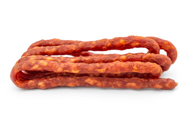 Dried thin meat sausages for beer on a white background.