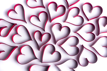 Red paper hearts on the white paper background. Valentine background concept.