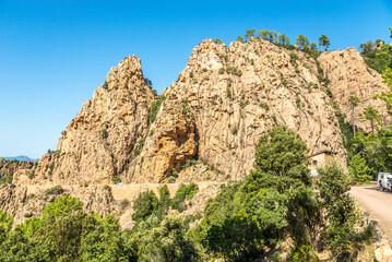 Fototapeta na wymiar View at the nature of Calanques de Piana near road to Ajaccio in Corsica - France