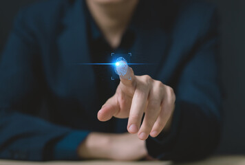 cyber security concept. businessman scan fingerprint shows a biometric finger, access data privacy...