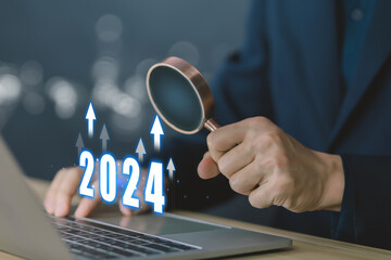 the economic analysis 2024. action business plan targets the new year 2024 growth. concept of...