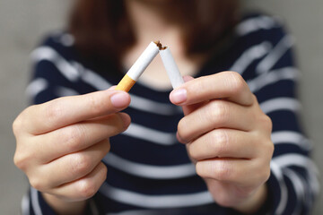 woman refusing cigarettes concept for quitting smoking and healthy lifestyle.or No smoking campaign...