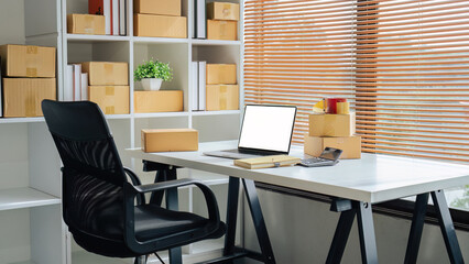 Small Business delivery modern room with laptop white screen at home office