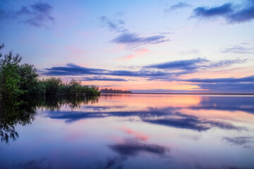 Magical sunrise over the lake, reflection in the water, Redmires Reservoir