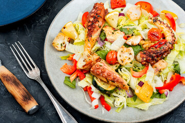 Octopus salad with vegetables.