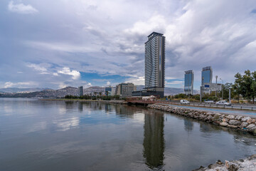 Fototapeta premium Bayrakli skyline view from Meles Park in Izmir City. Izmir is the third biggest city of Turkey.