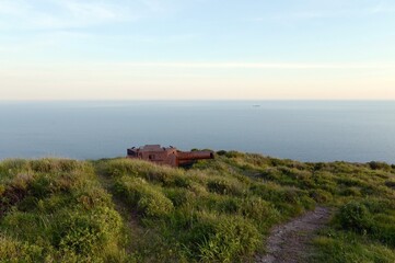 Rotating armored wheelhouse of the DM-6 stereoscopic rangefinder of tower battery No. 26 of the Shkotovsky fortified area on Askold Island   © b201735