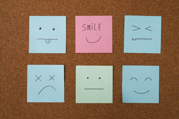 collection of colorful variety post it. paper note reminder sticky notes pin paper blue  on cork...