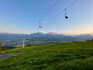 Cable car with open trailers in the mountains