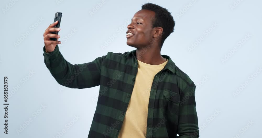 Poster smile, black man and smartphone with wave, hello and communication on a blue studio background. afri