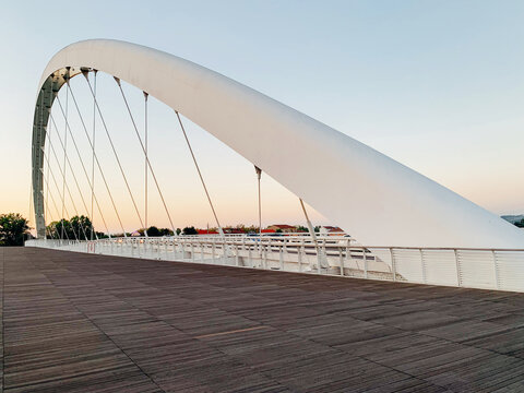 Alessandria, Italy - September 10, 2023: The new Cittadella bridge designed by Richard Meier. It connects the two banks of the river Tanaro and has become the city&rsquo;s architectural symbol.