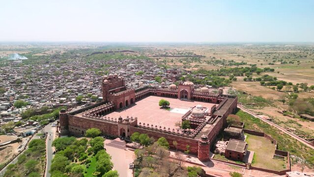 Fatehpur Sikri, India: Aerial view of Buland Darwaza (Victory Gate) and Jama Masjid mosque in historic town in Uttar Pradesh - landscape panorama of South Asia from above