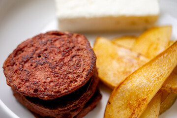 Food is on the table. Lunch on the windowsill. Breakfast by the window. Cutlets
