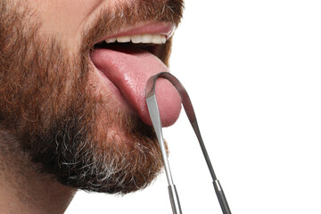 Man brushing his tongue with cleaner on white background, closeup - obrazy, fototapety, plakaty