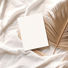 Blank paper and dry flowers on cloth