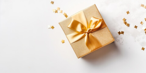 White background with golden gift box for special event. Valentines day, Christmas, Birthday concept.