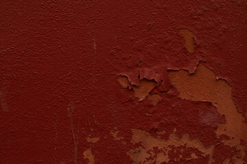 Dark red painted old wall plaster texture background
