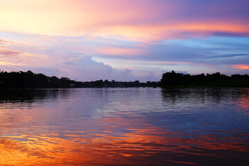 Beautiful  Silhouette Sunset and river  destination natural reflection of twilight with sunlight in Thailand