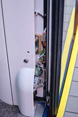The mechanism of closing and opening doors in a subway train car/ Close-up detail of a modern electric train door mechanism