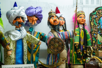 Very rare dolls are displayed with clothes for dolls made of clay