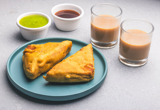 Delicious bread pakora with sweet & sour chutney and hot tea